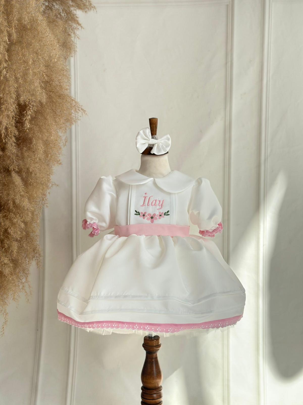 White & Pink Baby Girl Dress with Embroidered Name Detail + Matching Bow Headband | Elegant Birthday & Party Outfit