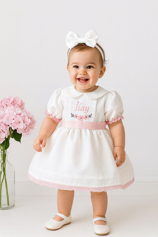 White & Pink Baby Girl Dress with Embroidered Name Detail + Matching Bow Headband | Elegant Birthday & Party Outfit