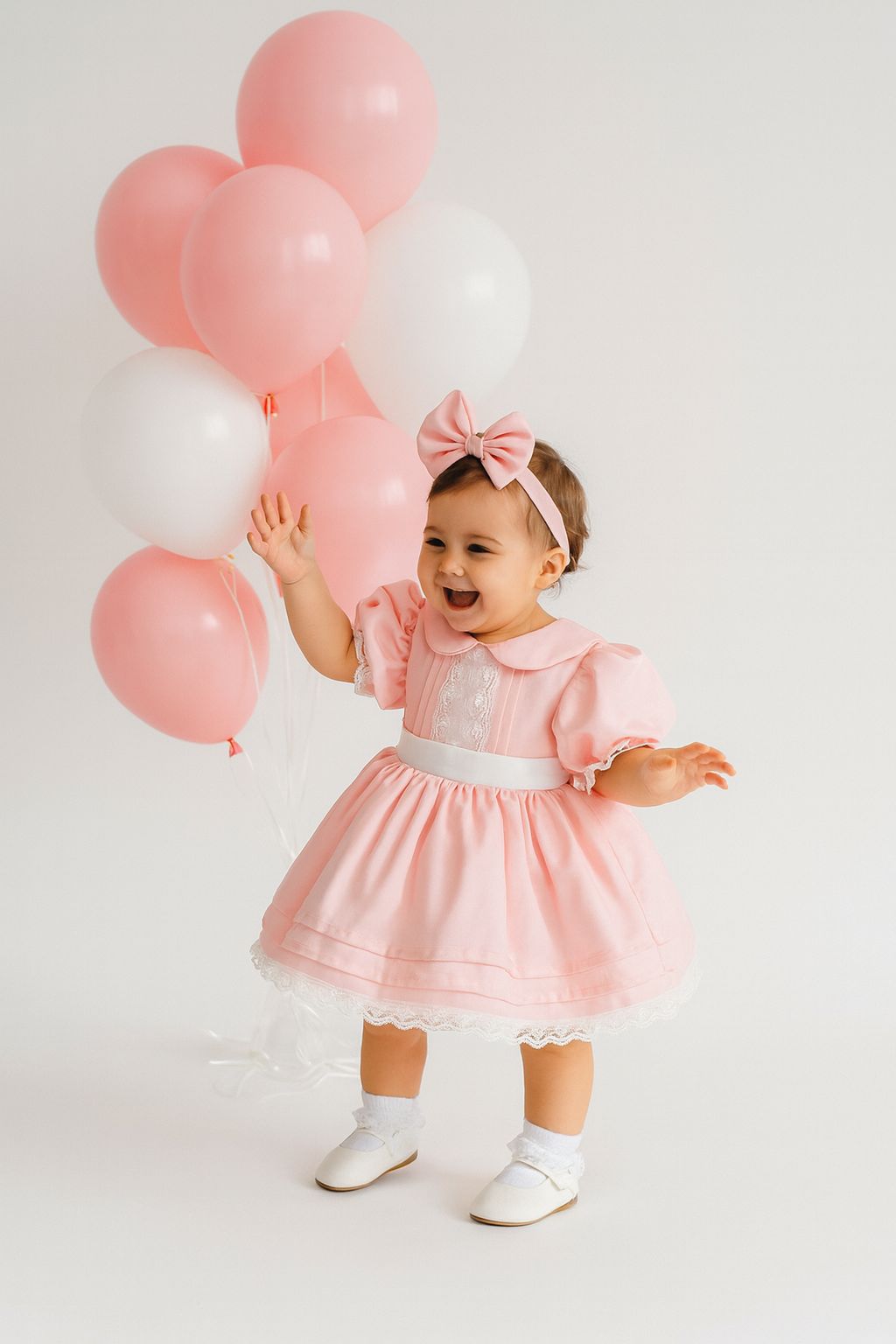 Vintage-Inspired Baby Girl Pink Puff Sleeve Dress with Lace Trim and Bow